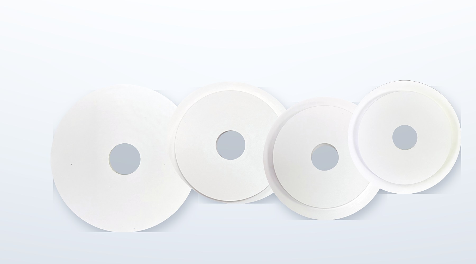Range of machined hexagonal boron nitride ceramic discs and rings manufactured by Pyroflux India